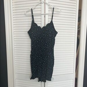 41 Hawthorn Black Romper with Blue Floral Design